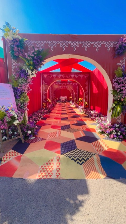Colourful arched entrance walkway decorated for a celebration