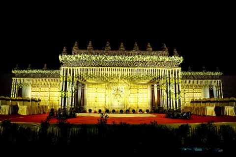 Lawn seating with sofas and chair rows at night, suited to large receptions and corporate events in Hyderabad